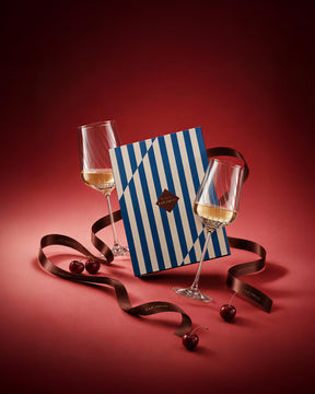 LUCARIS Holiday Atelier Crafted Universal Set: two crystal Chardonnay glasses with the blue striped gift box